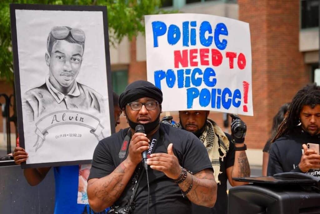 Vaun Mayes speaks at a police brutality protest. (Picture courtesy ComForce)